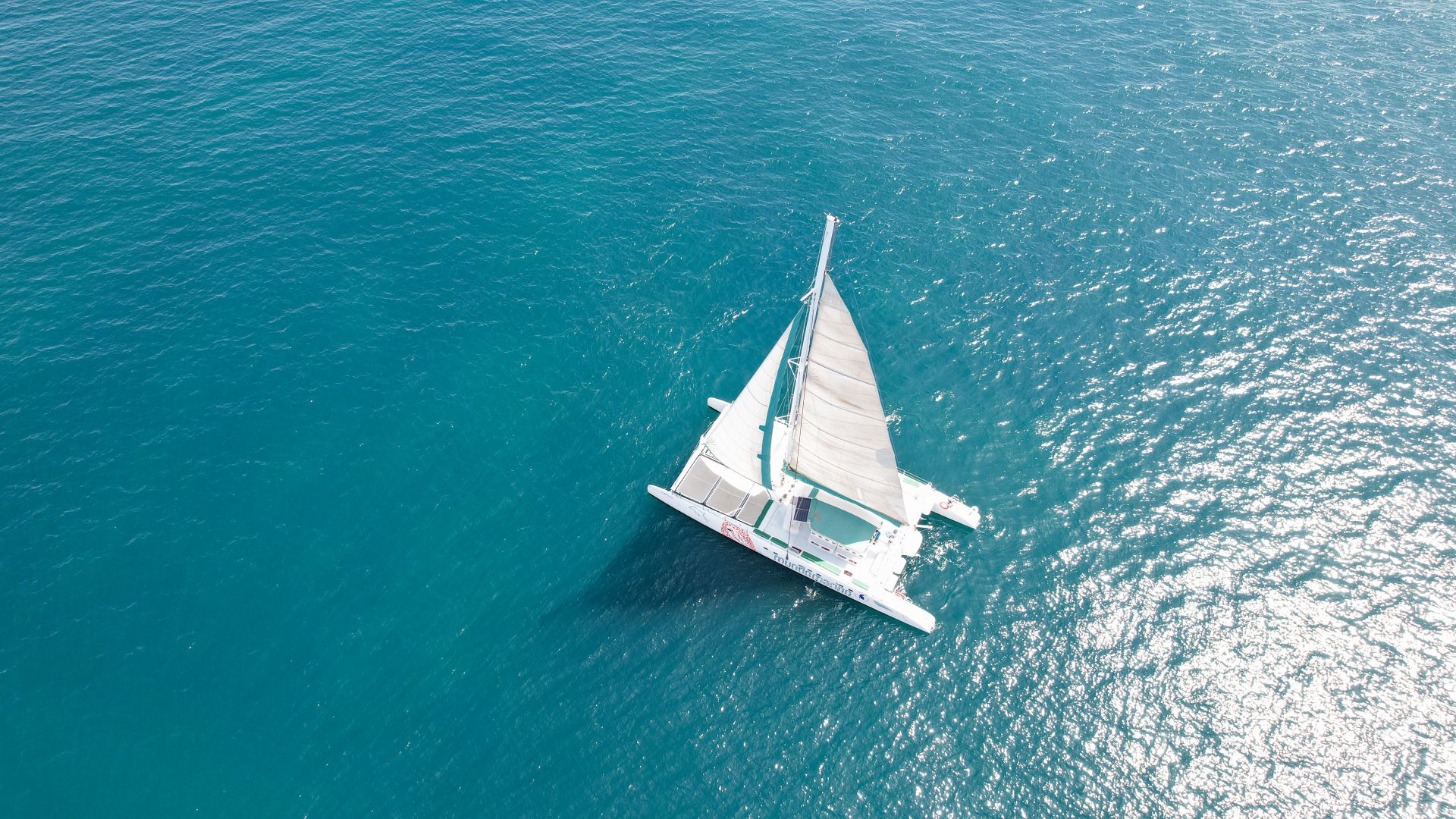 Aerial view of a Mundo Marino vessel under sail at sea